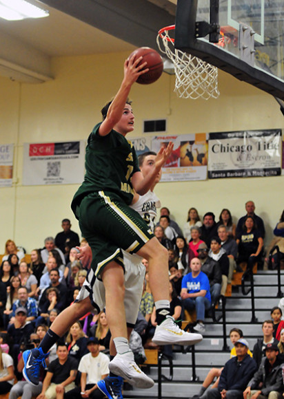 Santa Barbara High's Nick Busch gets to the rim for a basket.