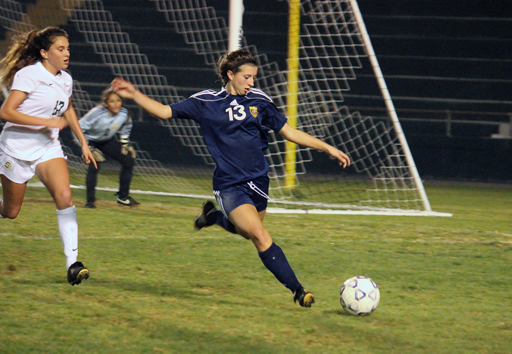 Dos Pueblos' Weslea Greyson takes the ball away from the DP goal. (Maddie Hoover / Presidio Sports)