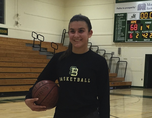 Amber Melgoza  the game ball she used to become Santa Barbara High's all-time leading scorer in girls basketball.