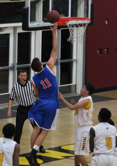 Scott Everman drives in for two of his 19 points in San Marcos' CIF playoff win over Firebaugh.