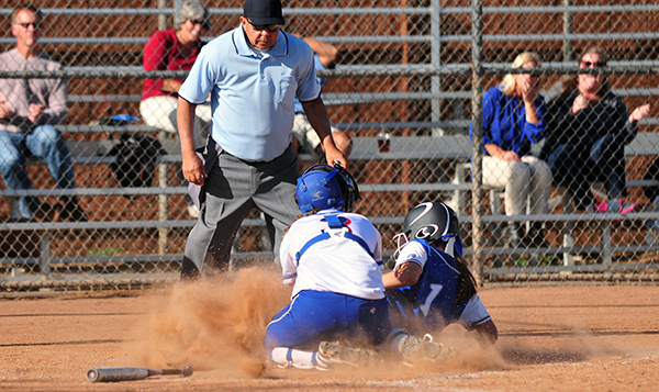 San Marcos' Hailey Fryklund makes the tag at home plate to end the game. (Presidio Sports Photos)