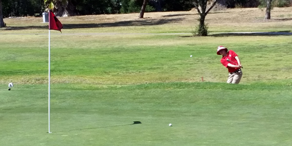 San Marcos' Sam Metzger hits from a sand trap on Monday. (Courtesy Photo)