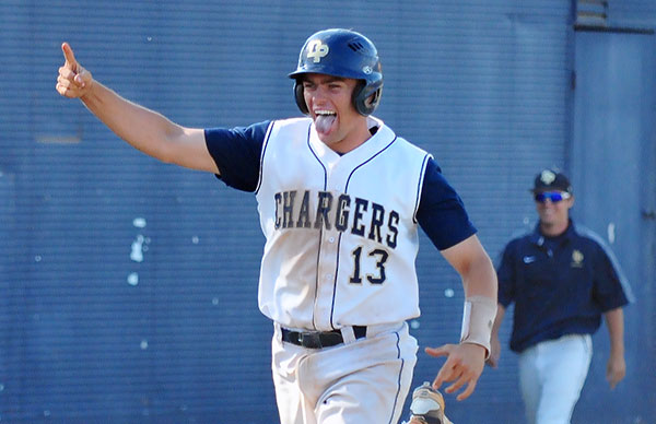 Dos Pueblos' Nick Noggle approaches home plate following his game-winning home run in the bottom of the seventh inning of a CIF Division 2 playoff game.