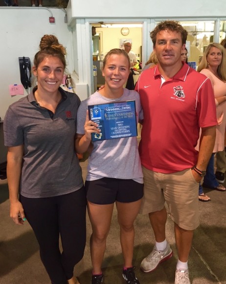 SBCC swimmer Rachelle Visser poses with coaches Sierra Peltcher and Chuckie Roth after receiving the Performance of the Meet Award at the state championships.