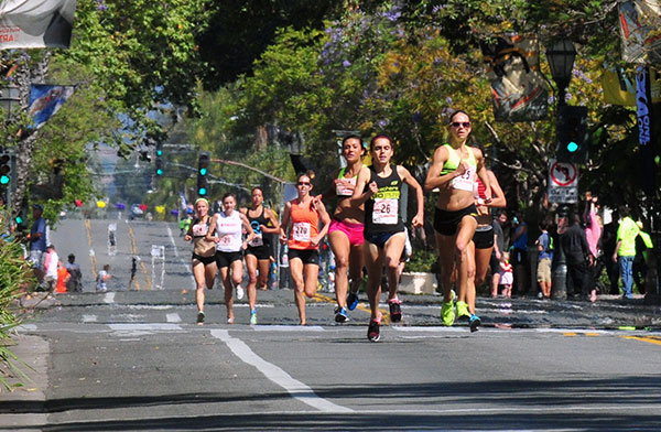 The women's Elite Division races down State Street. (Presidio Sports Photos)