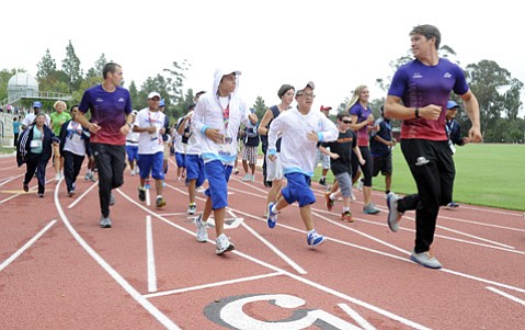 World-class athletes and coaches from Guatemala, Honduras, Nicaragua, and St. Kitts and Nevis practice for the 2015 Special Olympics World Games at Westmont College. (Paul Wellman Photo)
