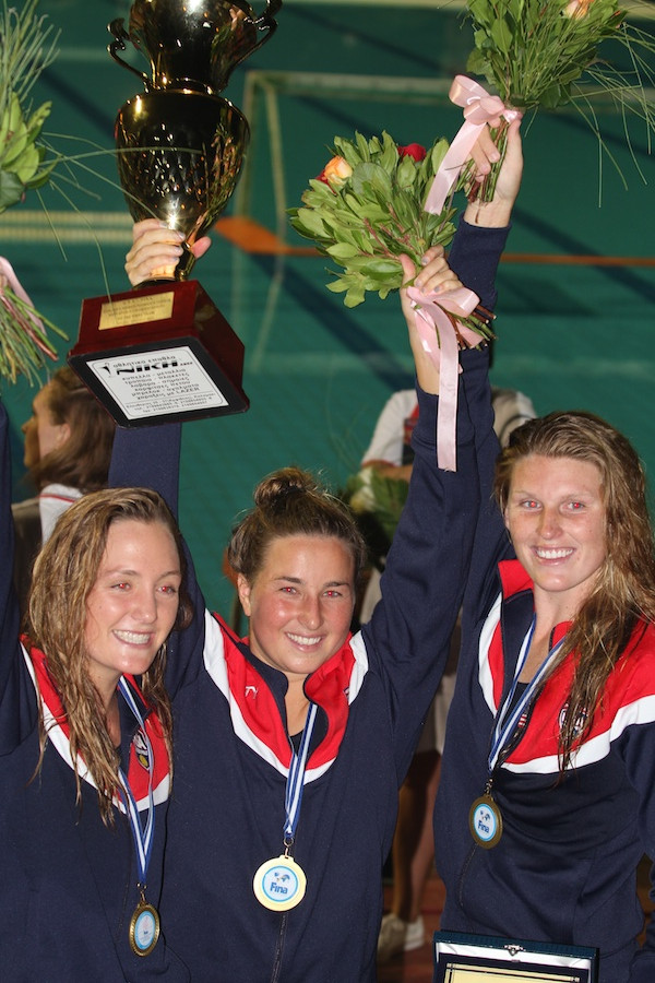 Team USA members and Santa Barbara Water Polo Club alums Mary Brooks, left, Jamie Neushul and Amanda Longan celebrate after winning the gold medal at the FINA Women's Junior World Water Polo Championship. (Peter Neushul photo)