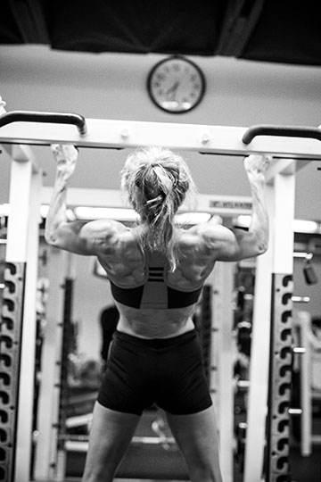 Suzanne in the weight room training for competition. (Grimmesey Photo)