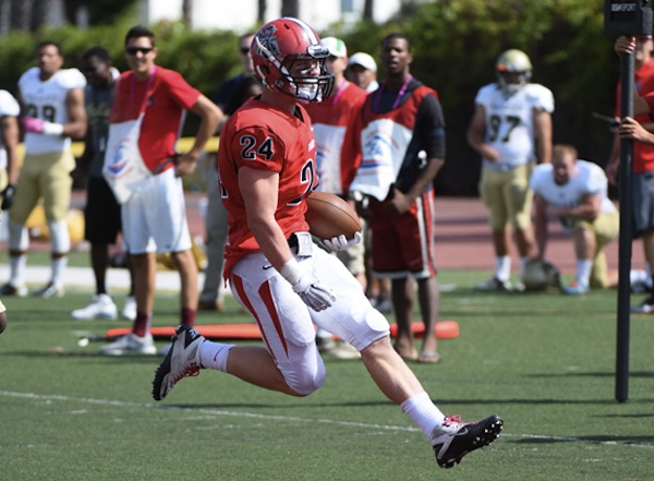 SBCC's Chad Woolsey scores the first of his two touchdowns during the first quarter. He rushed for 60 yards. (Photos by Ken Sciallo, Sevilla Photography)