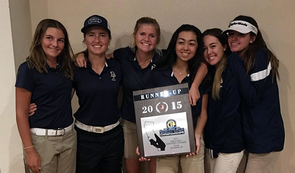 Dos Pueblos' golf team with its CIF runner-up plaque. 