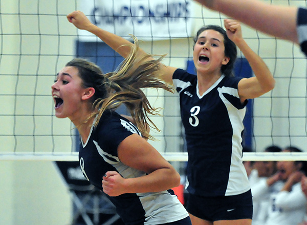 Phoebe Madsen, left, and Maddy Nicolson celebrate after a point during the CIF semifinal match.