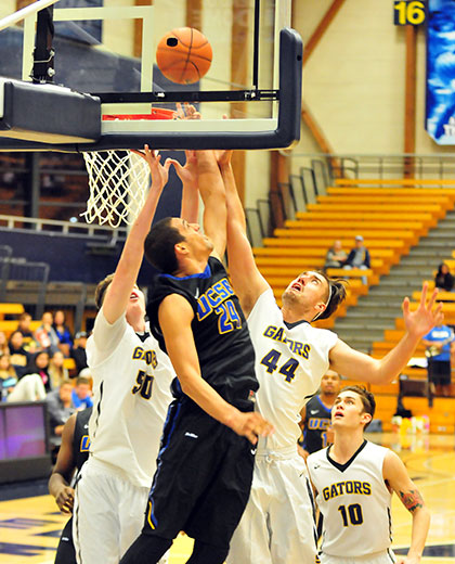 Michael Bryson gets to the hoop for a contested basket in the second half. 