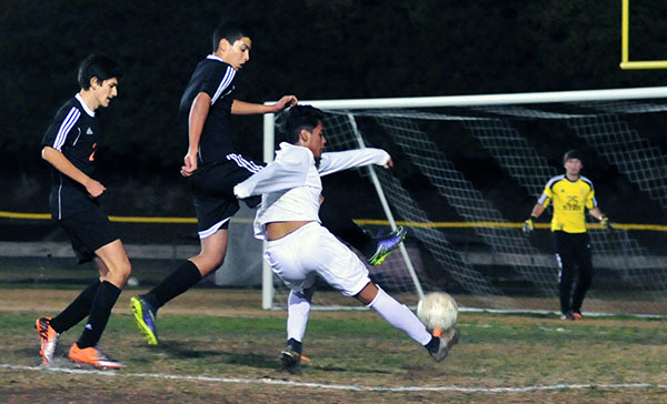 Santa Barbara High's Brandon Garcia takes a shot in Friday's game. (John Dvorak/Presidio Sports Photos)
